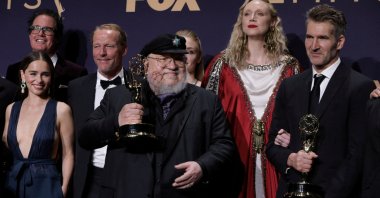 George R.R. Martin (C) and the cast and crew of Game of Thrones poses with their award, at 71st Primetime Emmy Awards, in Los Angeles, California, U.S., Sept. 22, 2019. (Reuters Photo)