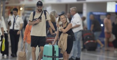 Tourists walk through Fraport TAV Antalya Airport, which is among the busiest airports in Europe and served more than 23 million passengers from 50 countries in 8.5 months in 2022, Antalya, Türkiye, Sept. 21, 2022. (AA Photo)