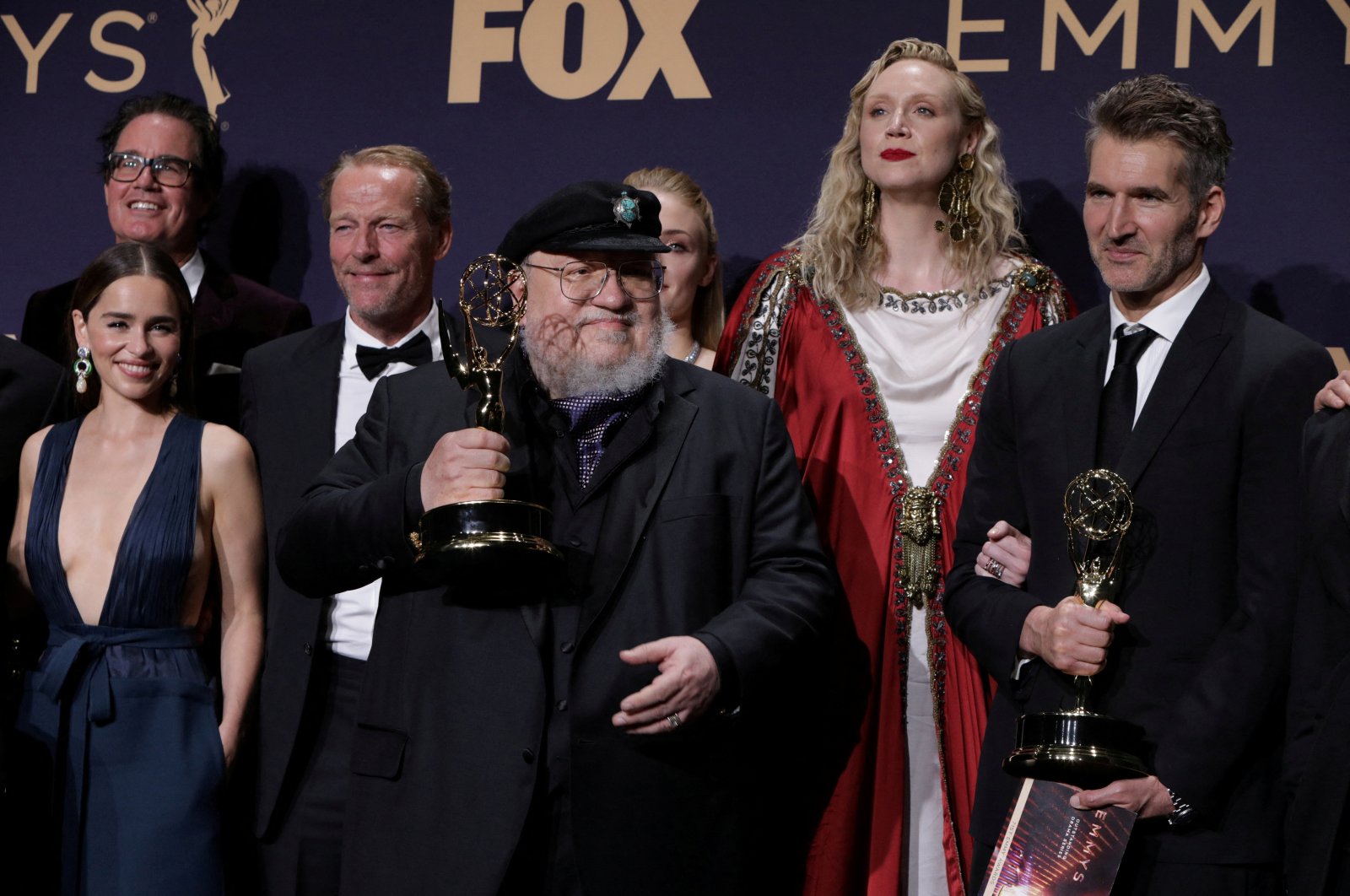 George R.R. Martin (C) and the cast and crew of Game of Thrones poses with their award, at 71st Primetime Emmy Awards, in Los Angeles, California, U.S., Sept. 22, 2019. (Reuters Photo)