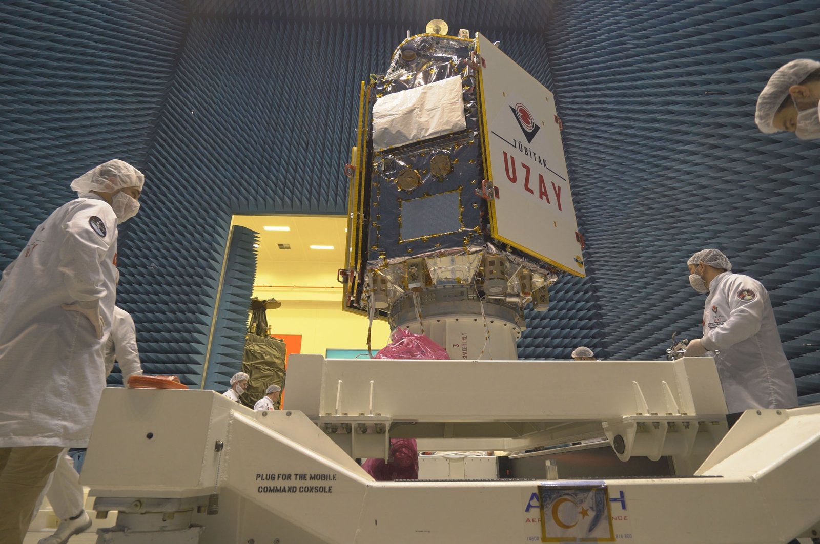 Scientists inspect Türkiye&#039;s new satellite IMECE at Vandenberg Space Force Base, in California, U.S., April 14, 2023. (AA Photo)