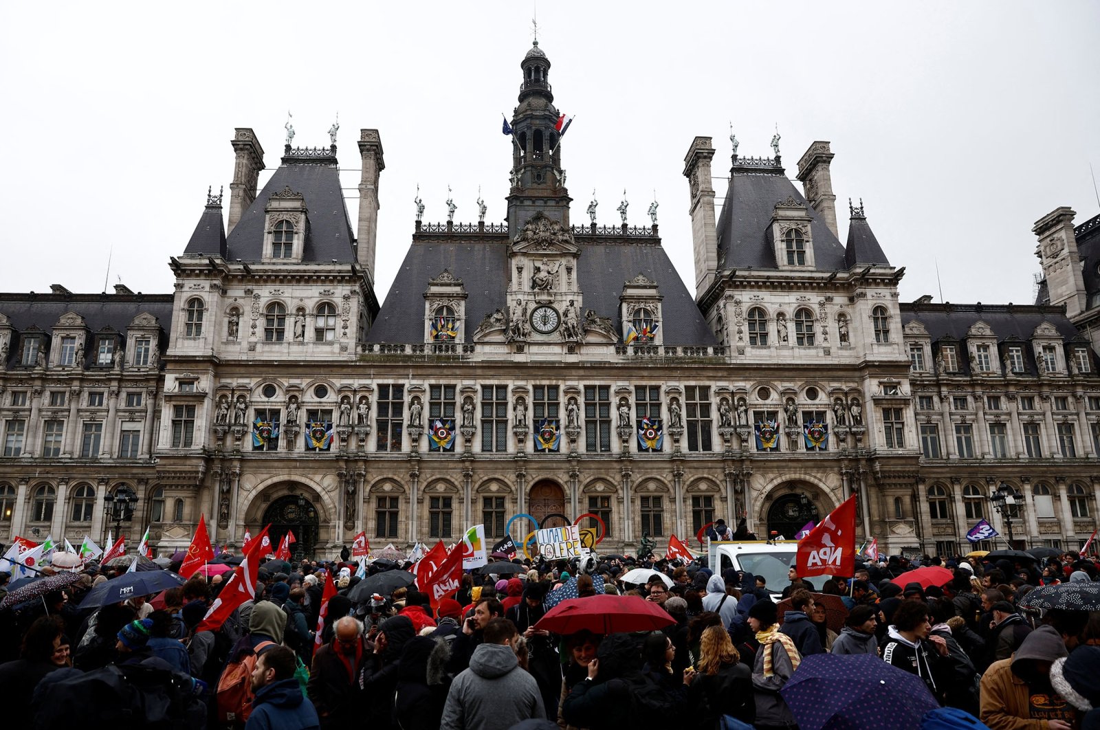 Protesters gather in front of the Paris City Hall after the Constitutional Council approved most of the French government&#039;s pension reform, in Paris, France, April 14, 2023. (Reuters Photo)