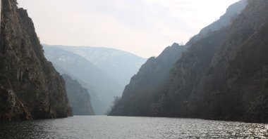 A scenic view of the lake and mountains against the sky in Matka, Macedonia, Feb. 13, 2022. (Getty Images Photo)