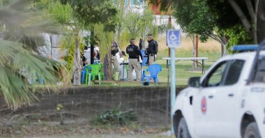 Authorities work at a crime scene where gunmen killed several people including a minor in Cortazar, Guanajuato state, Mexico, April 15, 2023.