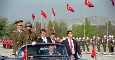 Then-President Turgut Özal (C) greets soldiers at a Republic Day parade, in Istanbul, Türkiye, Oct. 29, 1992. (AA Photo)