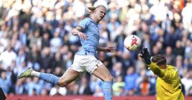 Manchester City's Erling Haaland scores his side's third goal during the English Premier League soccer match between Manchester City and Leicester City at Etihad Stadium, Manchester, UK., April 15, 2023. (AP Photo)