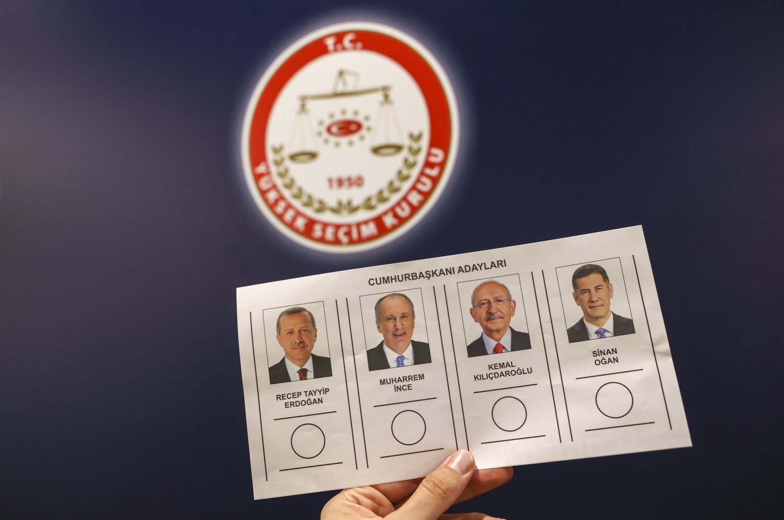 The ballot paper prepared by the Supreme Election Council (YSK) for the May 14 elections lists the presidential candidates in the following order from left to right: Recep Tayyip Erdoğan, Muharrem Ince, Kemal Kılıçdaroğlu and Sinan Oğan, Türkiye, April 14, 2023. (AA Photo)