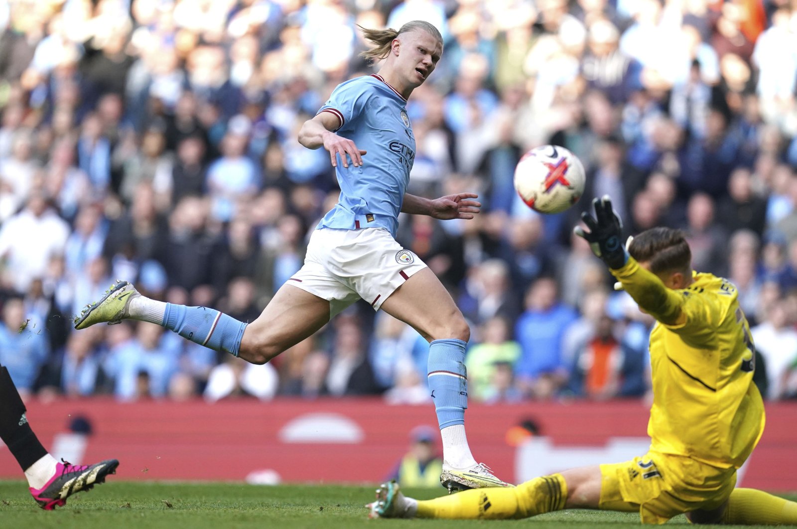 Manchester City&#039;s Erling Haaland scores his side&#039;s third goal during the English Premier League soccer match between Manchester City and Leicester City at Etihad Stadium, Manchester, UK., April 15, 2023. (AP Photo)