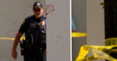 A bloody handprint marks a pillar the day after a shooting during a teenager's birthday party in Dadeville, Alabama, U.S., April 16, 2023. (Reuters Photo)