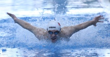 Turkish swimmer Ali Şiroğlu with autism, trains at Cebeci Sports Complex, Istanbul, Türkiye, April 13, 2023. (AA Photo)