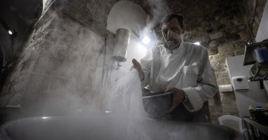 A service member prepares meals at Hospice Khassaki Sultan, in Jerusalem, April 13, 2023. (AA Photo)