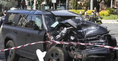 The damaged car of Lazio's player Ciro Immobile lies by the road after crashing, Rome, Italy, April 16, 2023. (AP Photo)