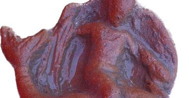 The photo shows a terracotta figurine of Eros riding a dolphin found in a newly discovered sanctuary, which dates from the 5th century B.C., that was first identified in 2019 along the ancient city walls of Paestum, southern Italy, April 15, 2023. (AP Photo)