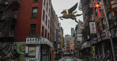 A street in Manhattan's Chinatown is empty after citywide pandemic restrictions forced people indoors, New York, U.S., March 28, 2020. (AP File Photo)