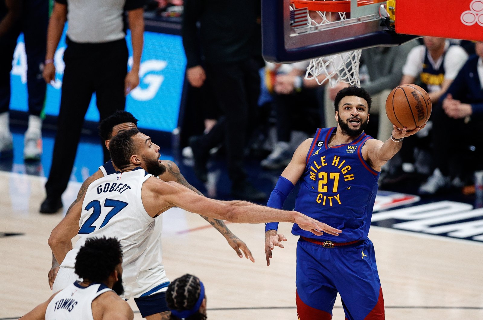 Denver Nuggets guard Jamal Murray (R) drives to the net against Minnesota Timberwolves center Rudy Gobert (L) in the third quarter during Game 1 of the 2023 NBA Playoffs at Ball Arena, Denver, U.S., April 16, 2023. (Reuters Photo)