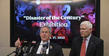 The co-chair of the Caucus on U.S.-Türkiye Relations and Turkish Americans Joe Wilson (L) speaks at the opening of the "Disaster of the Century" photo exhibition, New York, U.S., April 17, 2023. (AA Photo)