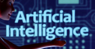 An illustration shows the words artificial Intelligence. (Reuters Photo)