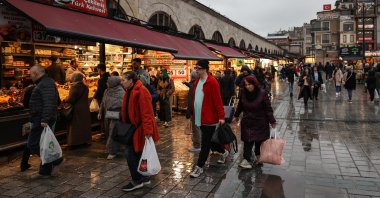 People are seen in the historic Eminönü neigborhood, in Istanbul, Türkiye, March 22, 2023. (AA Photo)