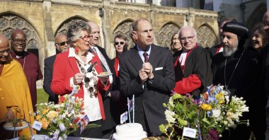 Prince Edward, Duke of Edinburg, tries the official coronation quiche at a Coronation Big Lunch hosted by the Archbishop of Canterbury, at Westminster Abbey, in London, U.K., April 18, 2023. (AP Photo)