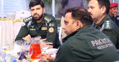 Members of the Pakistan search and rescue team are seen at the iftar dinner event by TIKA in Islamabad, Pakistan, April 19, 2023. (AA Photo)