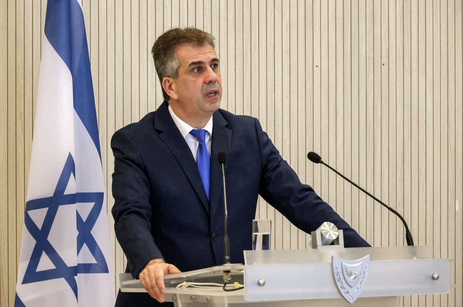 Israel&#039;s Foreign Minister Eli Cohen speaks during a joint news conference with his Greek Cypriot and Greek counterparts following their trilateral meeting at the foreign ministry headquarters in Nicosia, Greek Cyprus, on March 31, 2023. (AFP Photo)