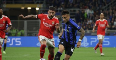 FC Inter Milan's forward Lautaro Martinez in action against SL Benfica's defender Nicolas Otamendi during the UEFA Champions League quarterfinal second leg match, Milan, Italy, April 19, 2023. (EPA Photo)