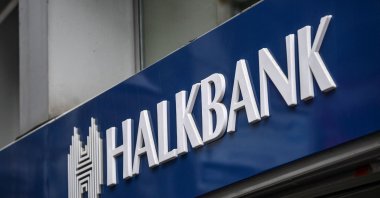 The logo of Halkbank is seen on one of the branches in Istanbul, Türkiye, Dec.1, 2017. (AFP Photo)