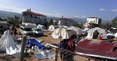 Tents damaged by a roof of a building following a tornado are seen in the Pazarcık district in Kahramanmaraş province, Thursday, April 20, 2023. (DHA Photo)