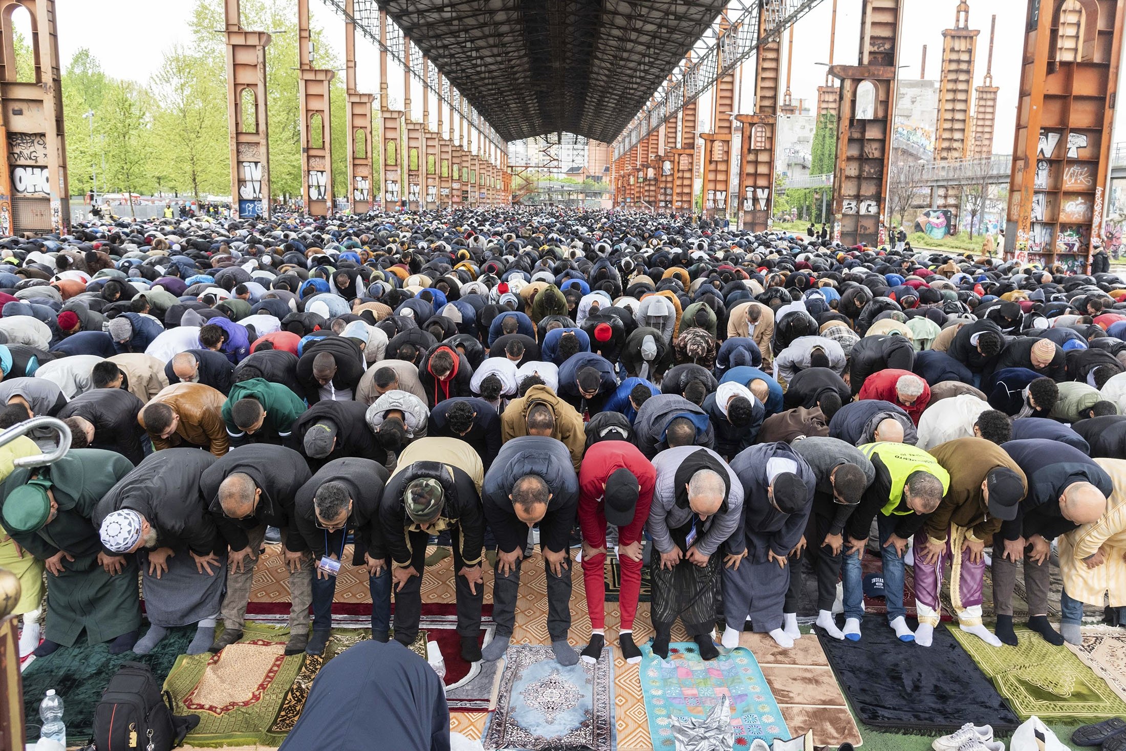 The faithful attend the final prayer of Eid al-Fitr, marking the end of Ramadan, at the Dora Park in Turin, Italy, April 21, 2023. (AP Photo)