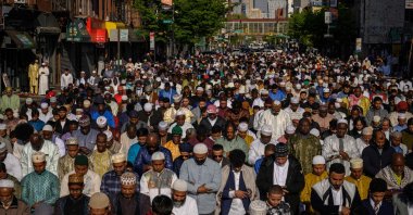 Members of the Muslim community attend prayers outside the Masjid At Taqwa mosque during Eid al-Fitr celebrations in the Brooklyn borough of New York City, U.S., April 21, 2023. (AFP Photo)