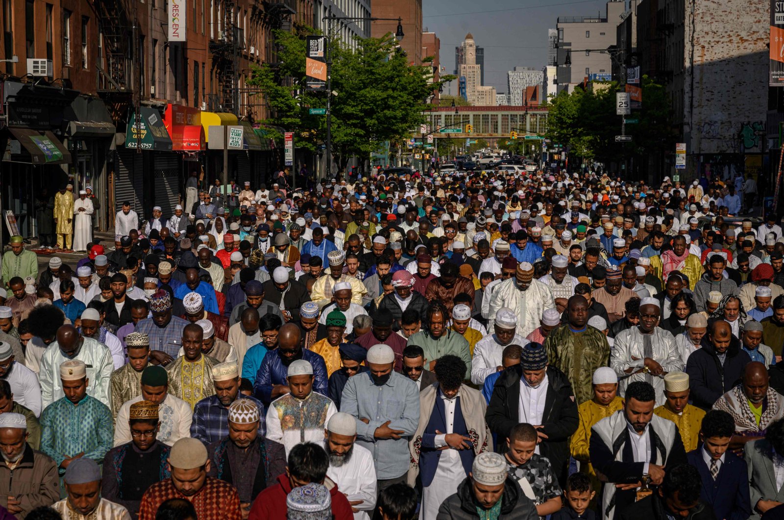 Members of the Muslim community attend prayers outside the Masjid At Taqwa mosque during Eid al-Fitr celebrations in the Brooklyn borough of New York City, U.S., April 21, 2023. (AFP Photo)