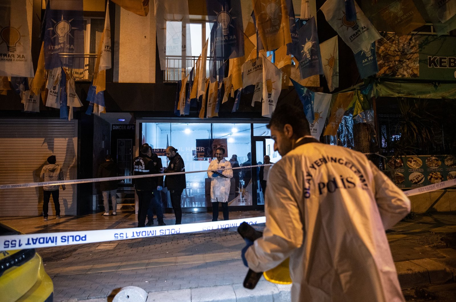 Police teams investigate an attack on the AK Party&#039;s election liaison office in Bahçelievler Kocasinan, Istanbul, Türkiye, April 22, 2023. (AA Photo)