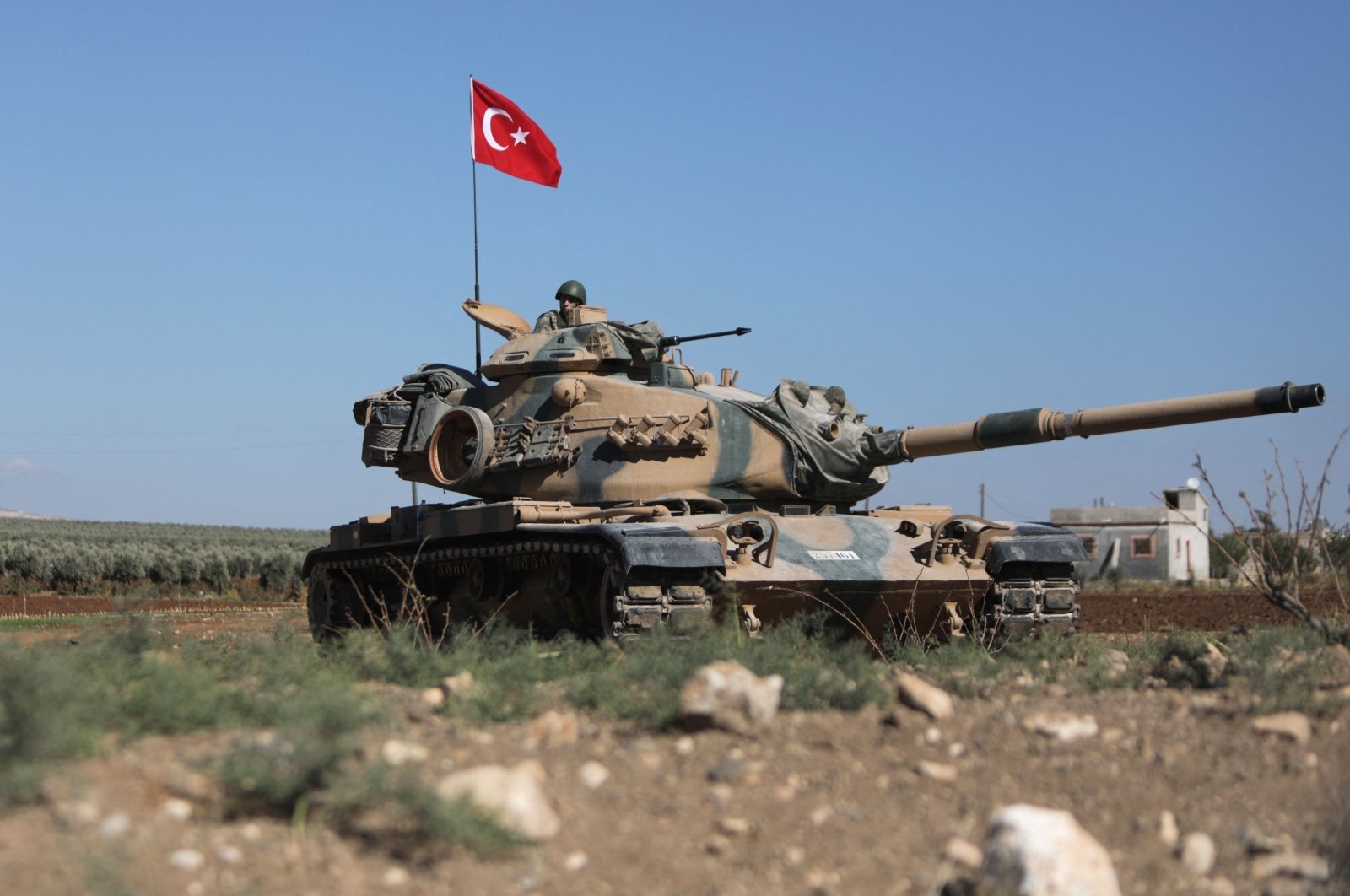 Turkish troops wait in a tank on the outskirts of Afrin, Syria, Oct. 19, 2022. (AFP Photo)
