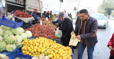 People are seen at a local marketplace in Kahramanmaraş province, southern Türkiye, April 7, 2023. (AA Photo)