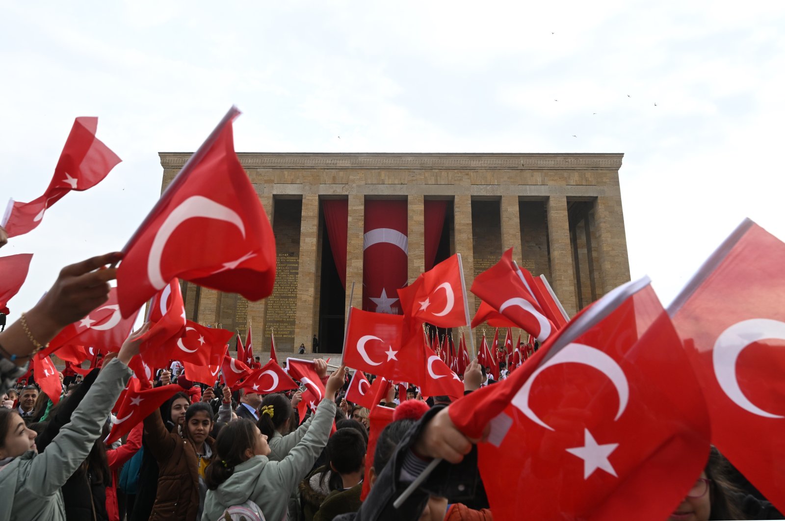 People wave flags in front of Anıtkabir in the capital Ankara, Türkiye, April 23, 2023. (AA Photo)