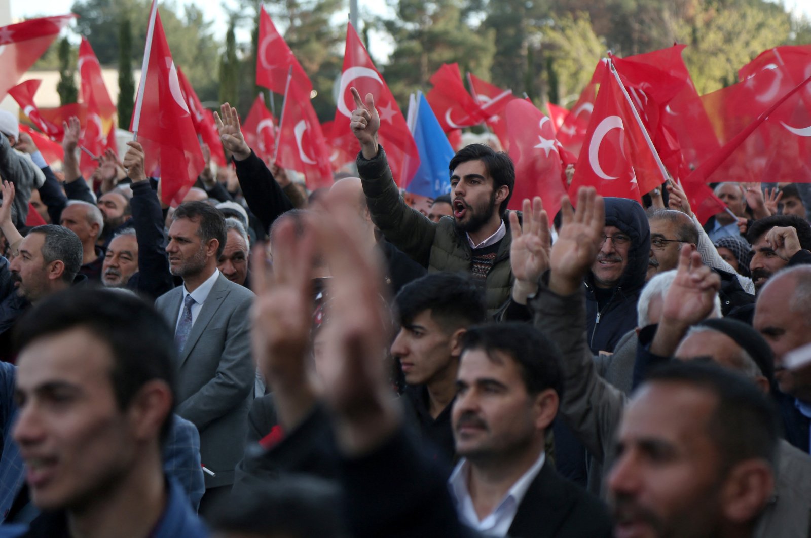 Supporters of President Recep Tayyip Erdoğan cheer as they listen to his speech during a ceremony in Diyarbakır, Türkiye, April 14, 2023. (REUTERS Photo)
