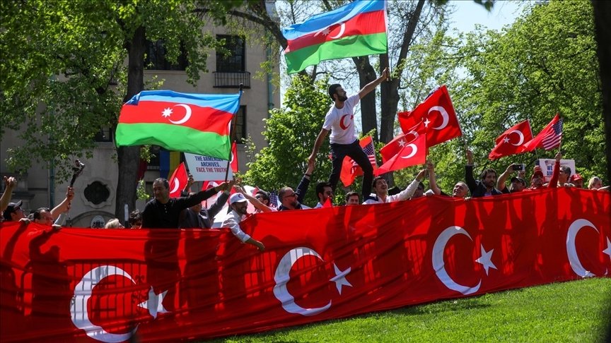 Demonstrators carrying Turkish and Azerbaijani flags protest Armenian &quot;genocide&quot; claims at a rally in Washington D.C., U.S., April 24, 2022. (AA Photo)