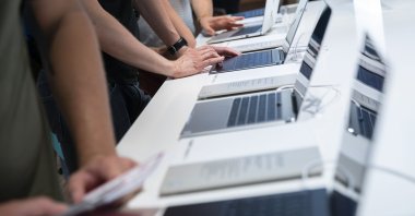 Try out a real-life model of the laptop you contemplate buying before you make any decision. (dpa Photo)