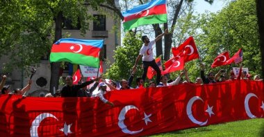 Demonstrators carrying Turkish and Azerbaijani flags protest Armenian &quot;genocide&quot; claims at a rally in Washington D.C., U.S., April 24, 2022. (AA Photo)