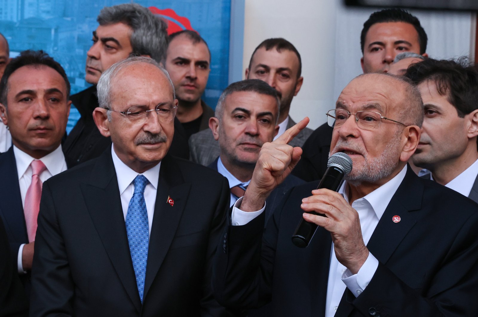 Turkish opposition leader Kemal Kılıçdaroğlu (L) listens as his Nation Alliance partner and Felicity Party (SP) Chair Temel Karamollaoğlu (R) speaks at a mosque opening in Istanbul, Türkiye, April 17, 2023. (AA Photo)