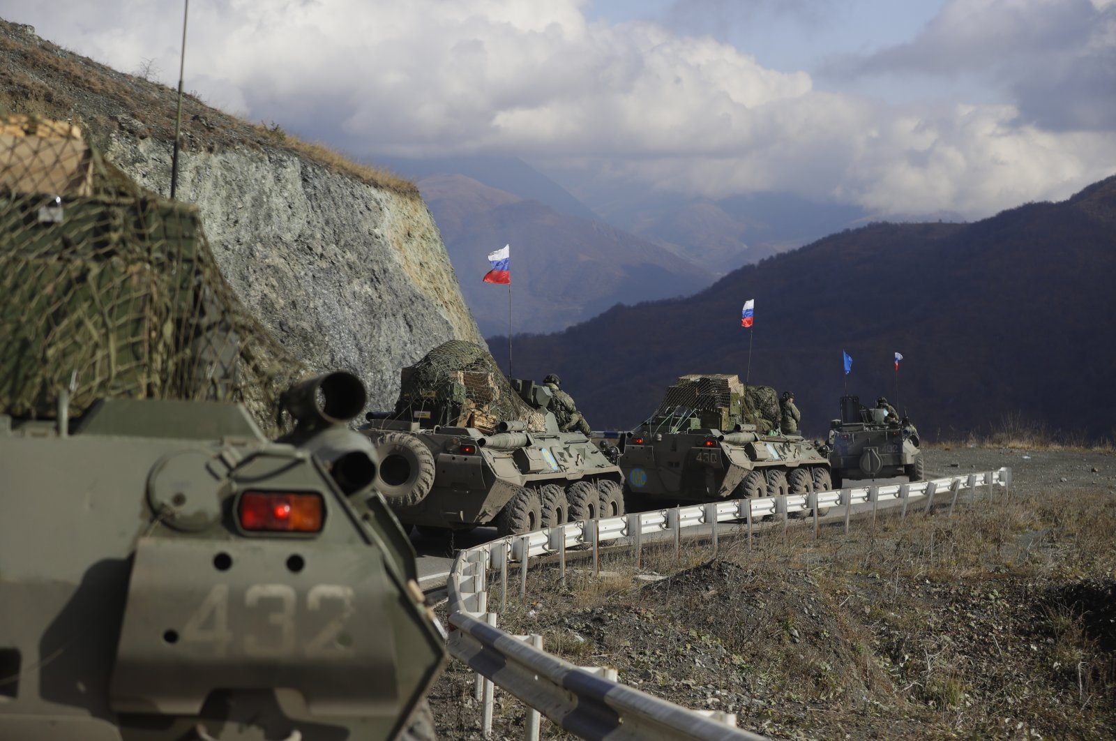 Russian military vehicles roll along a road toward the separatist region of Nagorno-Karabakh, Friday, Nov. 13, 2020. (AP File Photo)