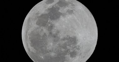 A full moon is seen over Mexico City, Mexico, April 5, 2023. (Reuters Photo)