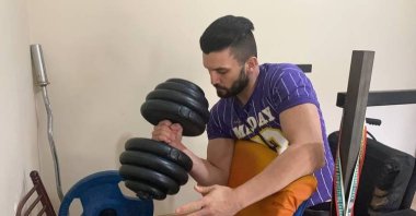 Turkish arm wrestler Sezer Uslucuk trains for the European Arm Wrestling Championships, Zonguldak, Türkiye, April 23, 2023. (AA Photo)