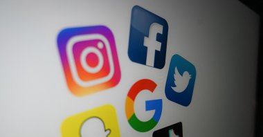 A photo shows the logo of online giants, Google, Facebook, Twitter, TikTok, Snapchat and Instagram on a computer screen in Lille, France, Oct. 21, 2020. (AFP File Photo)