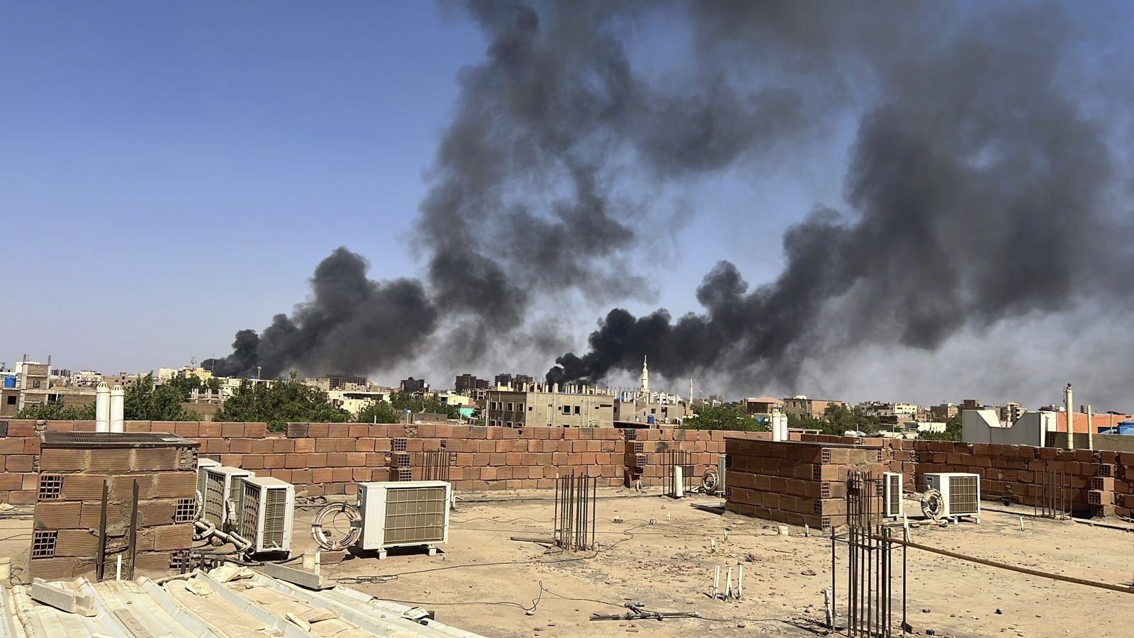 Smoke fills the sky in Khartoum, Sudan, April 21, 2023. (AP Photo)