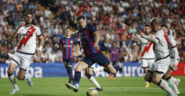 FC Barcelona&#039;s Robert Lewandowski shoots at goal during a La Liga match against Rayo Vallecano at Campo de Futbol de Vallecas, Madrid, Spain, April 26, 2023. (Reuters Photo)