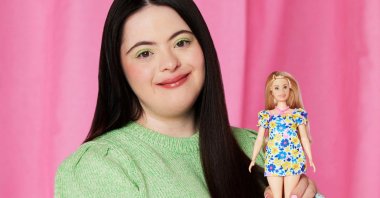 British model Ellie Goldstein poses with Barbie's first doll with Down's syndrome, in London, U.K., April 17, 2023. (Reuters Photo)