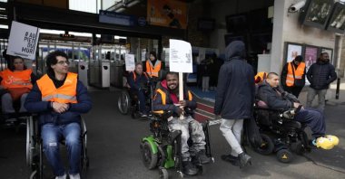 Disabled people protest at the Melun train station, Paris, France, April 26, 2023. (AP Photo)