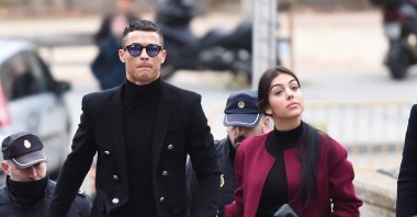 Cristiano Ronaldo (L) arrives with his girlfriend Georgina Rodriguez at the Audiencia Provincial de Madrid court, Madrid, Spain, Jan. 22, 2019. (Getty Images Photo)