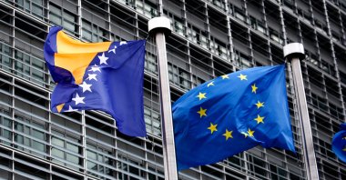 Flags of the EU and Bosnia and Herzegovina wave outside of the European Commission, Brussels, Belgium. March 4, 2019. (Shutterstock Photo)
