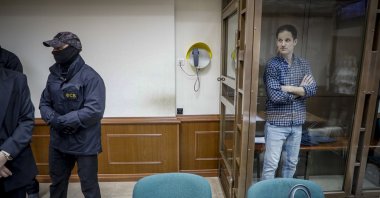 WSJ correspondent Evan Gershkovich (R) attends a court hearing of the Moscow City Court where they consider the demand of his defense to cancel his arrest, in Moscow, Russia, April 18, 2023. (EPA Photo)